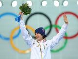Gold medalist Martina Sablikova of the Czech Republic celebrates on the podium during the flower ceremony for the Speed Skating Women's 5000m on day twelve of the Sochi 2014 Winter Olympics at at Adler Arena Skating Center on February 19, 2014