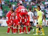 Melbourne players celebrate a Orlando Engelaar goal during the round 20 A-League match between Melbourne Heart and Brisbane Roar at AAMI Park on February 23, 2014