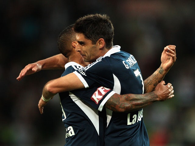 Guilherme Finkler of Victory celebrates scoring a goal during the round 20 A-League match between Melbourne Victory and Adelaide United at AAMI Park on February 22, 2014