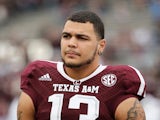 Mike Evans #13 of the Texas A&M Aggies waits on the field before the game against the Mississippi State Bulldogs at Kyle Field on November 9, 2013
