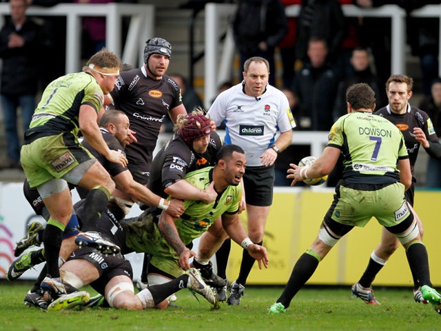 Salesi Ma'afu of Northampton saints releases the ball to Phil Dowson during the Aviva Premiership match between Newcastle Falcons and Northampton at Kingston Park on February 23, 2014