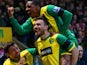Robert Snodgrass of Norwich City celebrates scoring the opening goal with team mates during the Barclays Premier League match between Norwich City and Tottenham Hotspur at Carrow Road on February 23, 2014