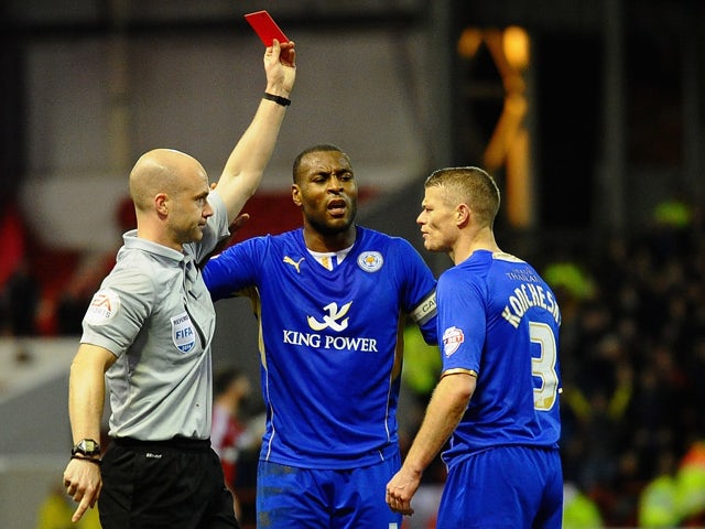 Paul Koncheskey of Leicester City is sent off by Referee A Taylor during the Sky bet Championship match between Nottingham Forest and Leicester City at City Ground on February 19, 2014