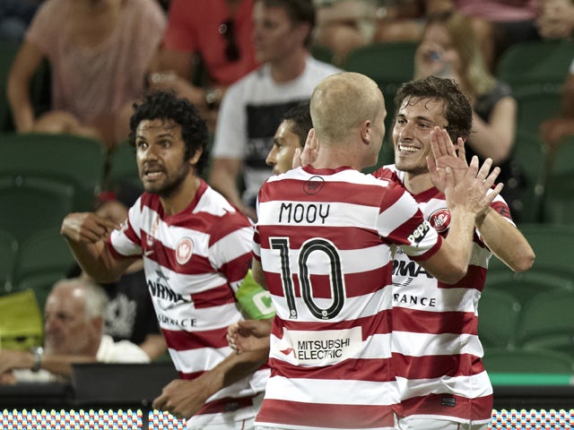 Western Sydney players celebrating during the round 20 A-League match between Western Sydney and Perth Glory at nib Stadium on February 22, 2014