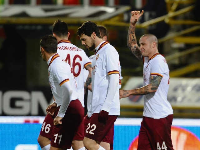Radja Naingollan # 44 of AS Roma celebrates after scoring a goal during the Serie A match between Bologna FC and AS Roma at Stadio Renato Dall'Ara on February 22, 2014