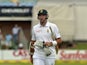South Africa's captain Graeme Smith walks off after been dissmised for 9 runs during the second test match between South Africa and Australia at St George's Park, in Port Elizabeth on February 20, 2014