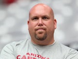 General Manager Steve Keim of the Arizona Cardinals watches practice during the team training camp at University of Phoenix Stadium on July 29, 2013