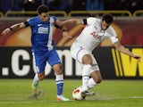 Dnipro's Victor Giuliano and Tottenham's Etienne Capoue in action during their Europa League match on February 20, 2014