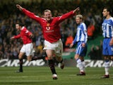 Wayne Rooney scores against Wigan Athletic in the League Cup final on February 26, 2006.