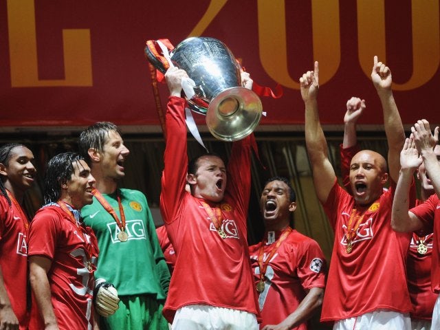 Wayne Rooney lifts the Champions League trophy on May 21, 2008.