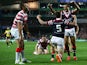 Shaun Kenny-Dowall of the Roosters celebrates with Anthony Minichiello after scoring his second try during the NRL World Club Challenge match between the Sydney Roosters and the Wigan Warriors at Allianz Stadium on February 22, 2014