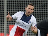 Paris Saint-Germain's French midfielder Yohan Cabaye celebrates scoring the 0-4 goal during the first-leg round of 16 UEFA Champions League football match against Bayer 04 Leverkusen on February 18, 2014