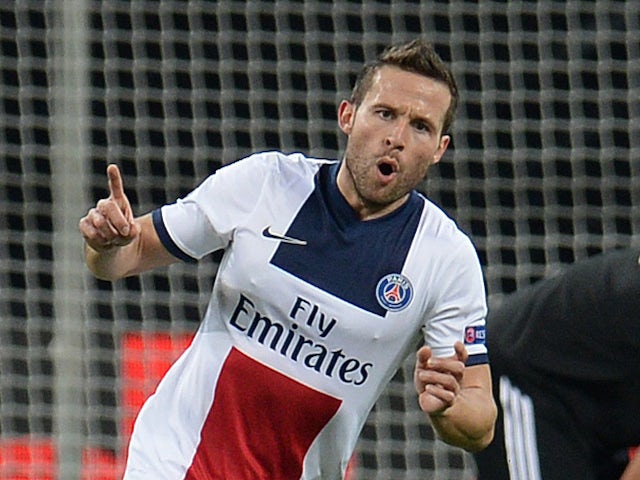 Paris Saint-Germain's French midfielder Yohan Cabaye celebrates scoring the 0-4 goal during the first-leg round of 16 UEFA Champions League football match against Bayer 04 Leverkusen on February 18, 2014