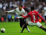 Aaron Lennon takes on Patrice Evra during the League Cup final on March 1, 2009.