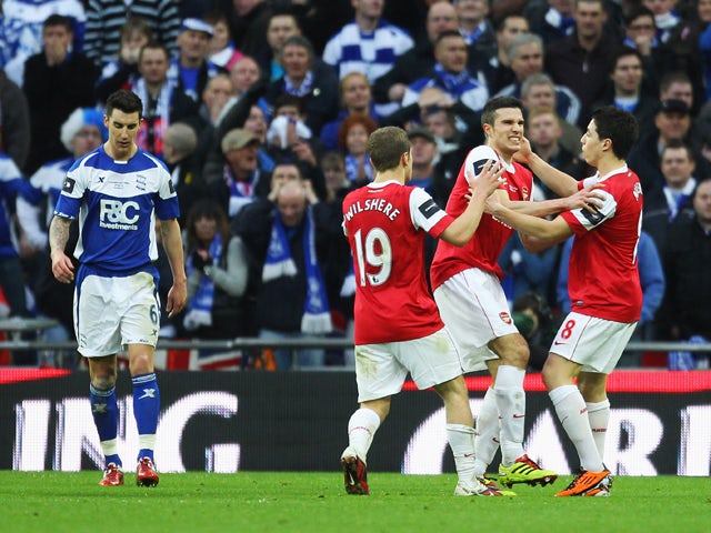 Robin van Persie of Arsenal after scoring his goal during the Carling Cup Final between Arsenal and Birmingham City at Wembley Stadium on February 27, 2011
