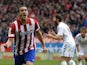 Atletico Madrid's midfielder Koke celebrates after scoring a goal during the Spanish league football match Club Atletico de Madrid vs Real Madrid CF at the Vicente Calderon stadium in Madrid on March 2, 2014