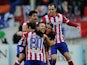 Atletico de Madrid players celebrate after scoring their 2nd goal during the La Liga match between Club Atletico de Madrid and Real Madrid CF at Vicente Calderon Stadium on March 2, 2014