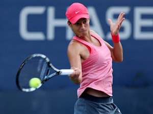 Garcia upsets Kvitova to reach third round