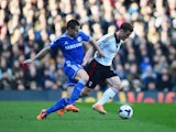 Scott Parker of Fulham holds off Cesar Azpilicueta of Chelsea during the Barclays Premier League match between Fulham and Chelsea at Craven Cottage on March 1, 2014