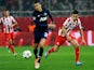 Manchester United's Chris Smalling and Olympiakos' Hernan Perez in action during their Champions League match on February 25, 2014