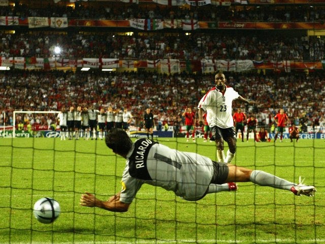 England's Darius Vassell has his penalty saved by Portugal goalkeeper Ricardo on June 24, 2004.