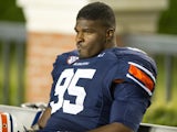 Defensive end Dee Ford #95 of the Auburn Tigers reacts on the bench during their game against the Georgia Bulldogs on November 10, 2012 