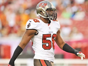 Dekota Watson #56 of the Tampa Bay Buccaneers sets for play against the New Orleans Saints on September 15, 2013