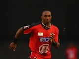 Dwayne Bravo of the Renegades fields during the Big Bash League match between the Melbourne Renegades and the Sydney Sixers at Etihad Stadium on January 18, 2014