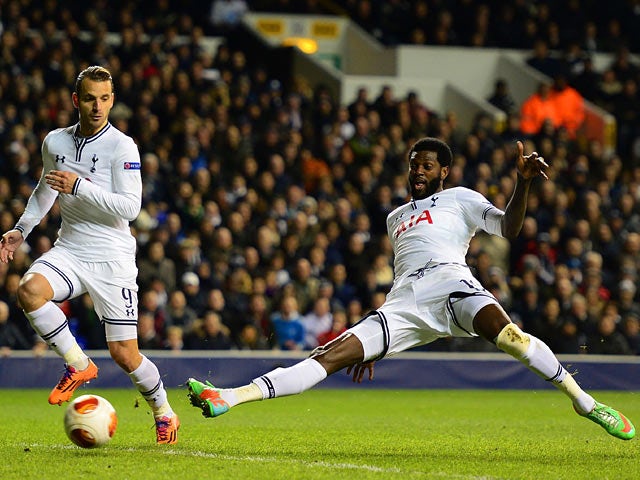 Teottenham's Emmanuel Adebayor scores his team's second goal against Dnipro during their Europa League match on February 27, 2014