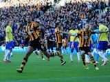 Curtis Davies of Hull City celebrates as he scores their first goal during the Barclays Premier League match between Hull City and Newcastle United at KC Stadium on March 1, 2014