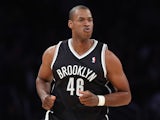 Jason Collins of the Brooklyn Nets runs down the court against the Los Angeles Lakers at Staples Center on February 23, 2014