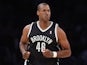 Jason Collins of the Brooklyn Nets runs down the court against the Los Angeles Lakers at Staples Center on February 23, 2014