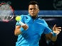 Jo-Wilfried Tsonga returns the ball to Victor Hanescu during their match in the ATP Dubai Duty Free Tennis Championships on February 25, 2014