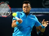 Jo-Wilfried Tsonga returns the ball to Victor Hanescu during their match in the ATP Dubai Duty Free Tennis Championships on February 25, 2014