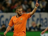 Real's Karim Benzema celebrates after scoring the opening goal against Schalke during their Champions League match on February 26, 2014