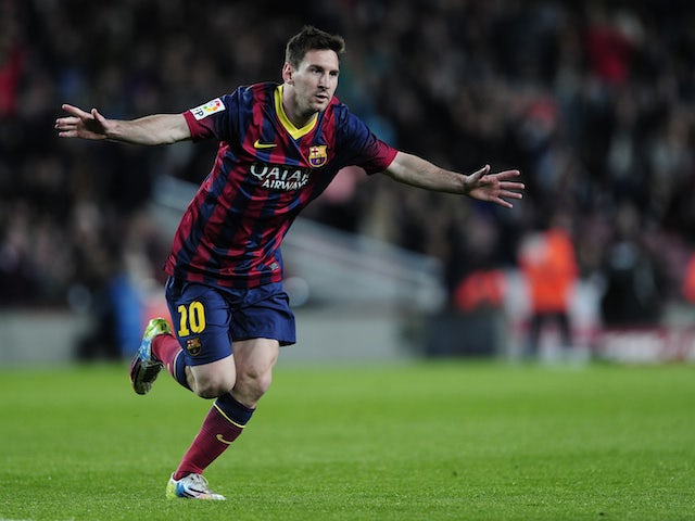 Barcelona's Argentinian forward Lionel Messi celebrates his goal during the Spanish league football match FC Barcelona vs UD Almeria at the Camp Nou stadium in Barcelona on March 2, 2014