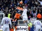 Montpellier's French forward Mbaye Niang vies with Lyon's French midfielder Maxime Gonalons during the French L1 football match between Olympique Lyonnais (OL) and Montpellier on March 2, 2014