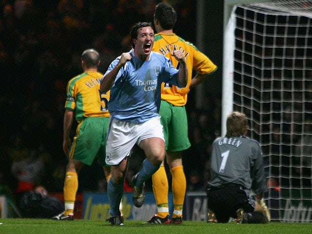 Man City's Robbie Fowler celebrates after scoring the winner against Norwich during their Premier League match on February 28, 2005
