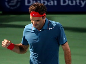 Federer eases through in Dubai