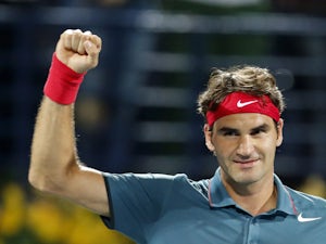 Federer battles past Tursunov