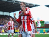 Jon Walters celebrates scoring during the Barclays Premier League match between Stoke City and Arsenal at Britannia Stadium on March 1, 2014