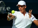 Tomas Berdych returns the ball to Marius Copil during their match in the ATP Dubai Duty Free Tennis Championships on February 25, 2014