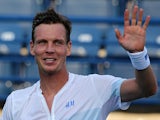Tomas Berdych celebrates his win over Sergiy Stakhovsky during their match in the ATP Dubai Duty Free Tennis Championships on February 26, 2014