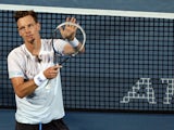 Czech Republic's Tomas Berdych celebrates after defeating France's Jo-Wilfried Tsonga during their quarter final match in the ATP Dubai Duty Free Tennis Championships on February 27, 2014