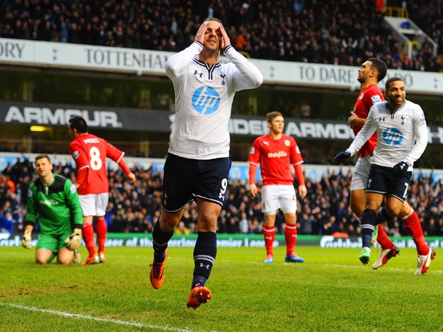 Roberto Soldado of Tottenham Hotspur celebrates scoring the opening goal during the Barclays Premier League match between Tottenham Hotspur and Cardiff City at White Hart Lane on March 2, 2014