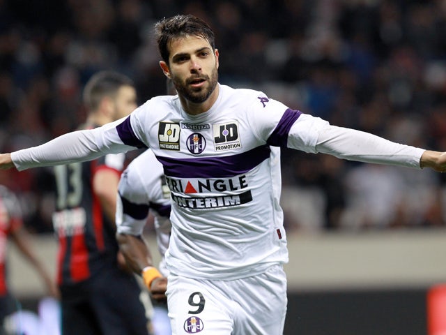 Toulouse's Israeli forward Eden Ben Basat celebrates after scoring a goal during the French L1 football match between Nice (OGCN) and Toulouse (TFC) on March 1, 2014 