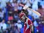 West Indies batsman Darren Sammy celebrates a quick half century during the first One Day International match bewteen West Indies and England at the Sir Vivian Richard Stadium in St John's, February 28, 2014