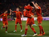 Marouane Fellaini #8 of Belgium is congratulated by tema mates after he scores the first goal of the game during the International Friendly match between Belgium and Ivory Coast at The King Baudouin Stadium on March 5, 2014