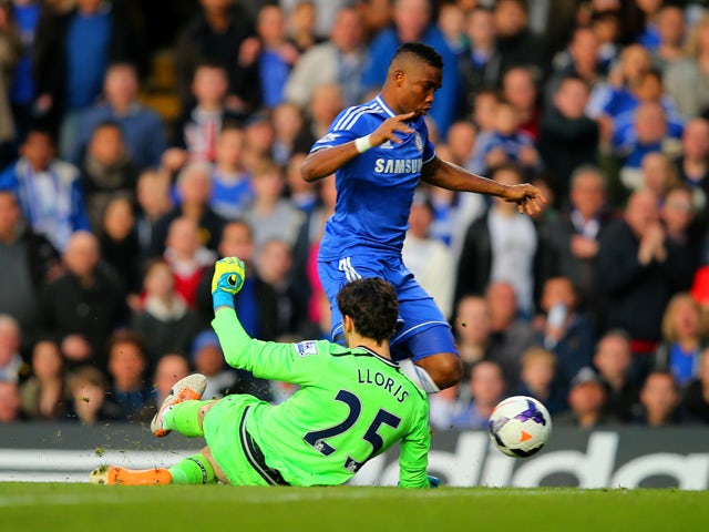 Samuel Eto'o of Chelsea goes down following a collision with goalkeeper Hugo Lloris of Spurs during the Barclays Premier League match between Chelsea and Tottenham Hotspur at Stamford Bridge on March 8, 2014 