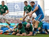 Ireland's Cian Healy scores a try against Italy during their Six Nations match on March 8, 2014